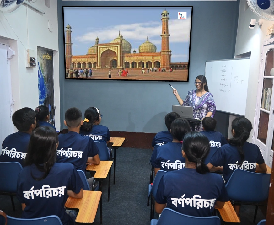 Students attending a smart classroom lesson at Barnoparichay Smart Class in Garden Reach, Kolkata.